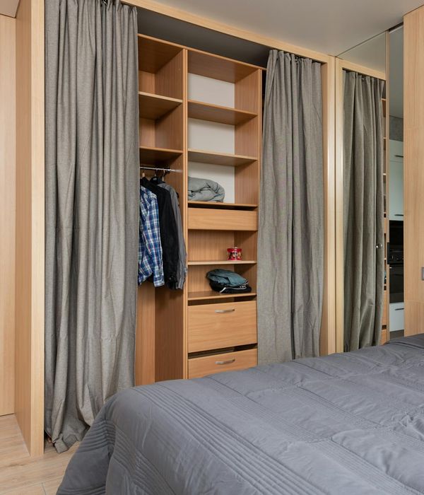 A serene and spacious room with warm lighting and minimalist decor, perfect for focused movement.